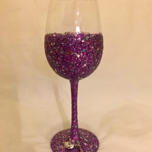 A Hand crafted Sparkle Wine Glass Purple w/charm--Made by order with glitter on it.