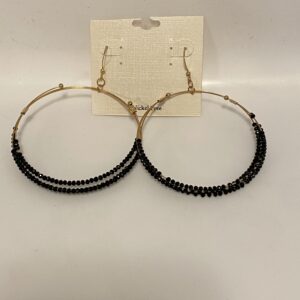 A pair of Black Stones 2 3/4" Triple Hoop Earrings with gold beading.
