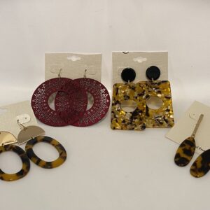 A pair of 23 Christmas In July Animal Print with a Little Burgundy earrings.