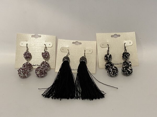 Three pairs of 23 Christmas In July Pink & Black Set earrings with tassels and tassels.