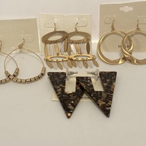 A group of '23 Christmas In July Brushed Gold & Abstract Animal hoop earrings on a white background.