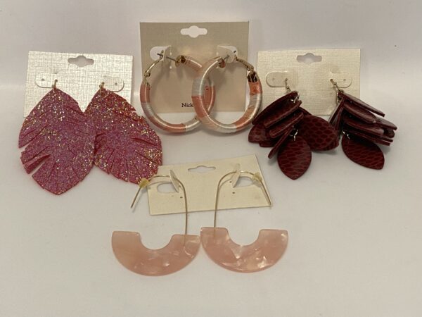 A group of '23 Christmas In July Pink & Burgundy Set earrings with different colors and designs.