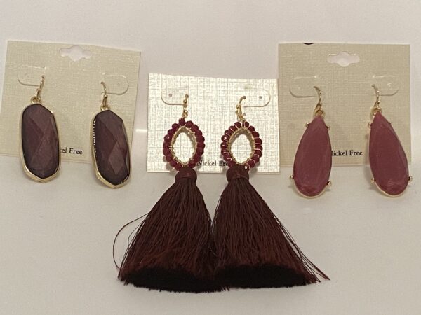 Three pairs of earrings with '23 Christmas In July Shades of Burgundy on them.