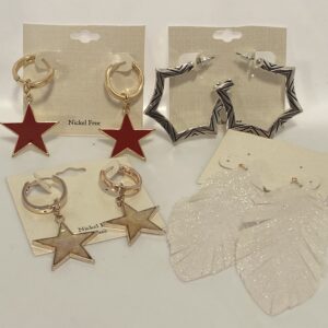 A variety of '23 Christmas In July Brushed Gold & Abstract Animal shaped earrings on a white background.