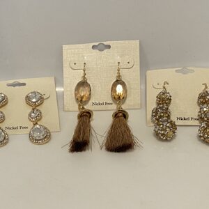 Three pairs of '23 Christmas In July All That Glitters is Gold Set with tassels and tassels.